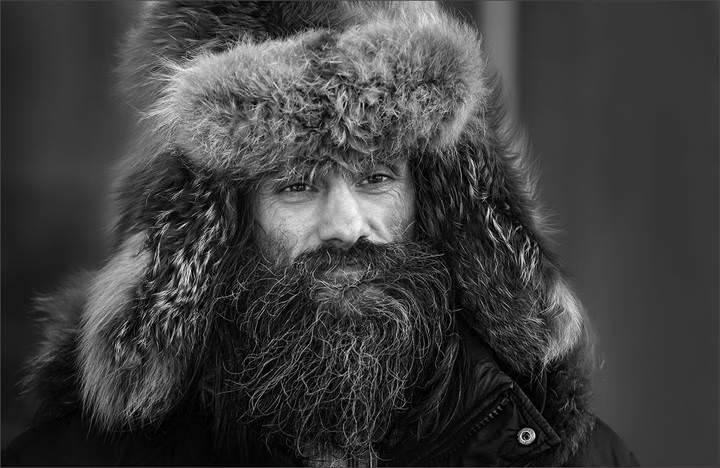 В шапке...
