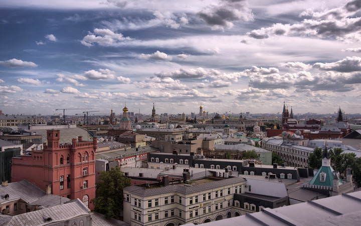 Город