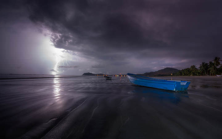  lightning hitting at sea shore
