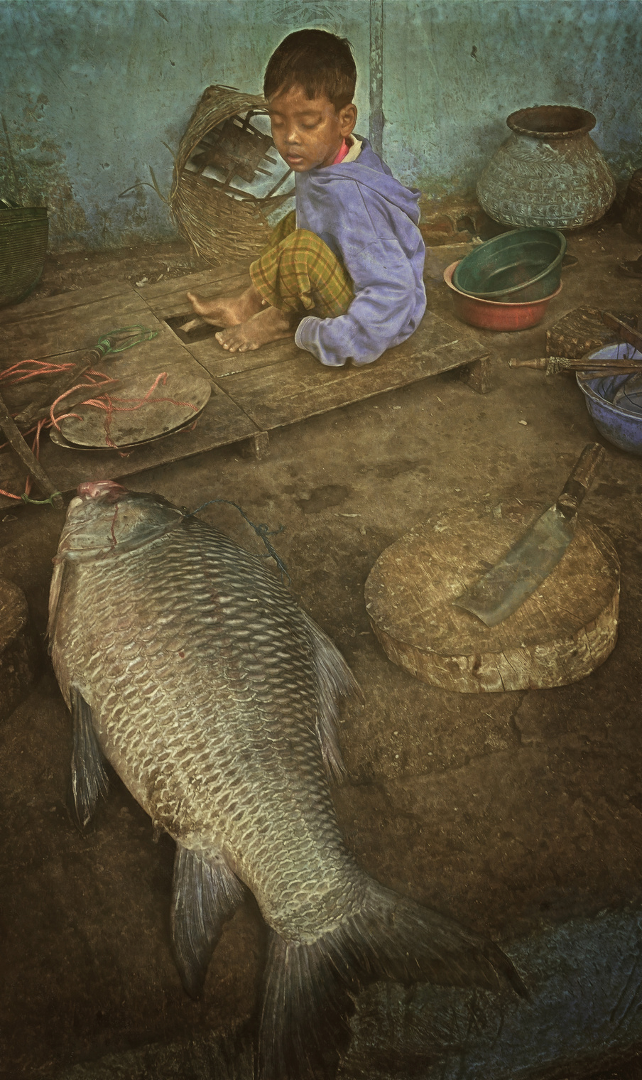 Бирманский мальчик и рыба.