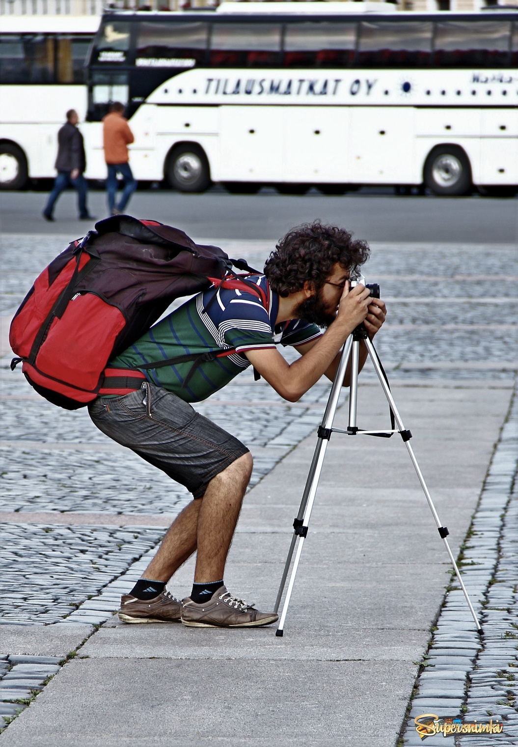 Турист-фотограф