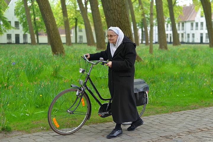 The biking beguine of Bruges.